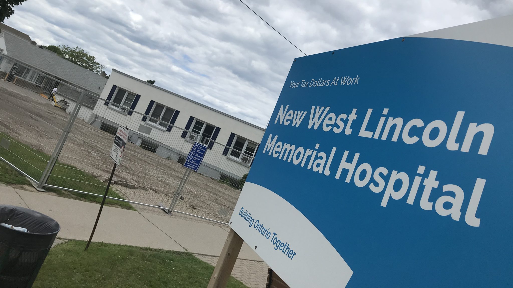 Signage outside W L M H reading New West Lincoln Memorial Hospital